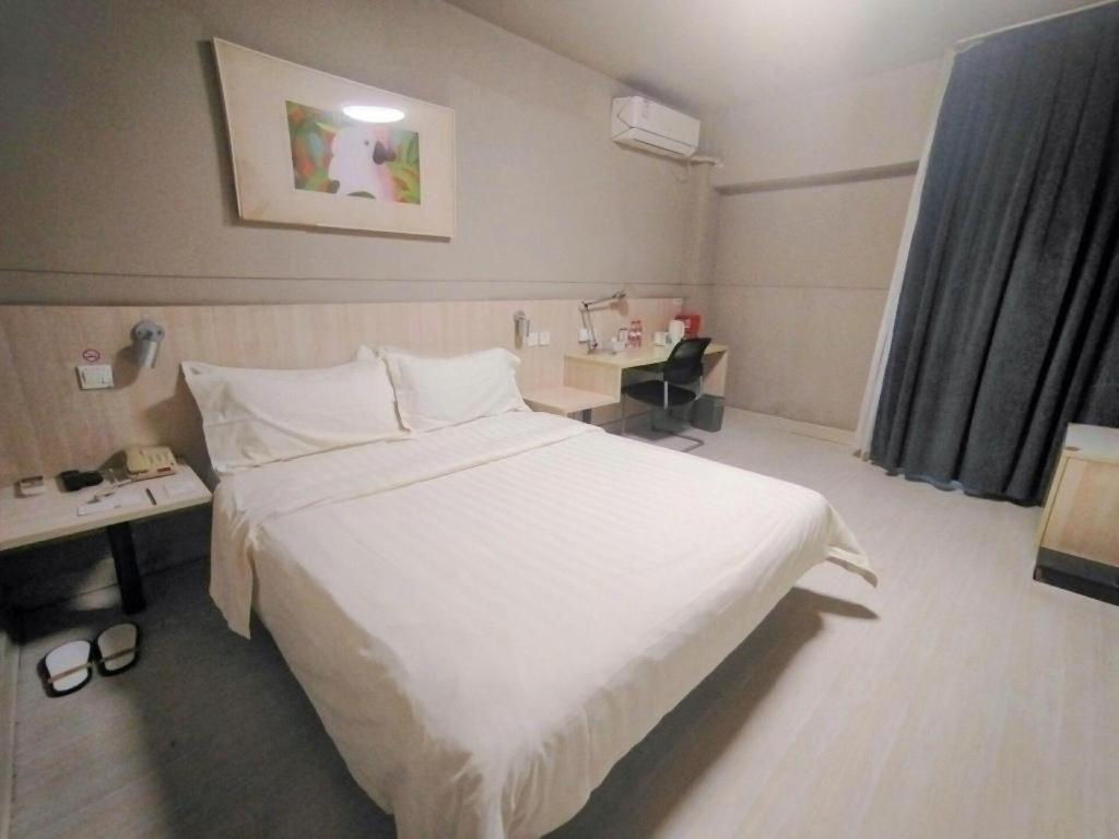 จินเจียง อินน์ สถานีรถไฟเจิ้งโจว สถานีรถไฟใต้ดินจตุรัสเอ้อฉี ภายนอก รูปภาพ